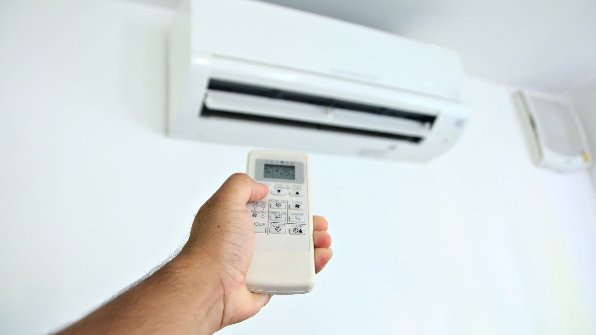 Ductless mini-split being controlled by remote